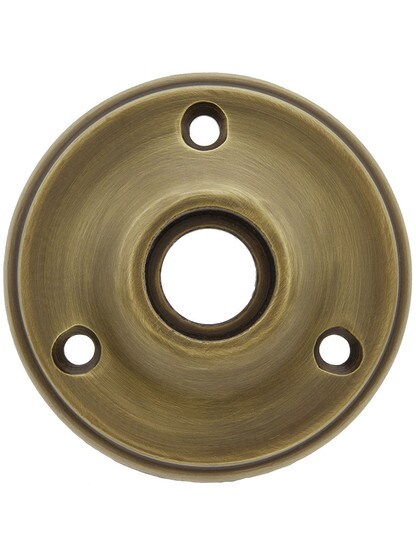 2 1/4 inch Cast Brass Rosette With 21/32 inch Collar in Antique Brass.